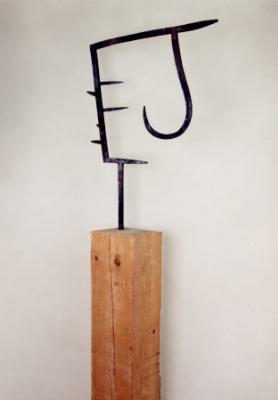 Escultura "Gancho de colgar o porco"